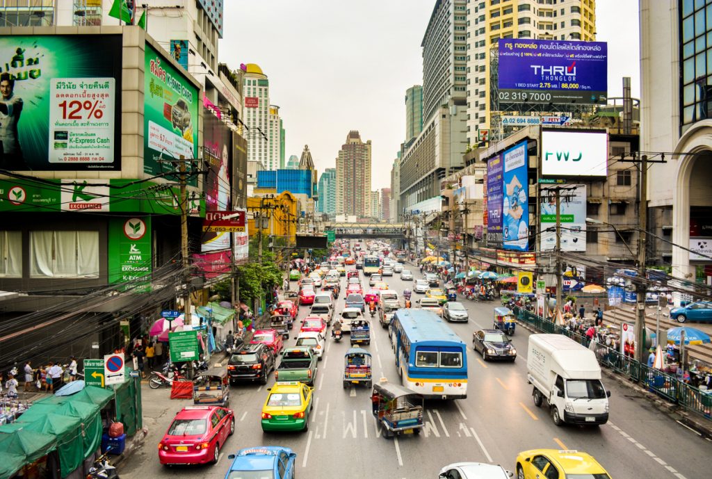Photo of a busy four lane road in Siam Square, Bangkok, Thailand.