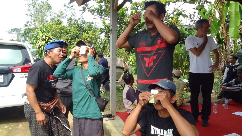 Farmers at Kintamani exploring the low cost Foldscope microscopic lens—IMG 20250722 120446 1