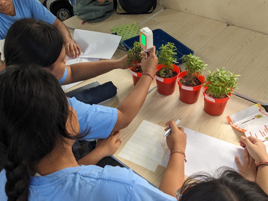 Trying out the soil sensor to measure soil pH at SMP Sekolah Menengah Pertama Negeri 3–PXL 20250717 024035716.MP
